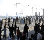 القوات الامنية تعلن القبض على "مندسين اثنين" في ساحة التحرير (صور)