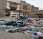 بالصور:مناطق تشكو من تكدس النفايات وحرقها في كربلاء