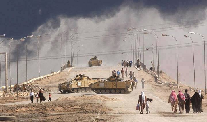 صورة ارشيفية توثق مقاومة البصرة للاحتلال عام 2003 وتفضح نظام البعث الذي سلم بغداد الى الغزاة دون مقاومة