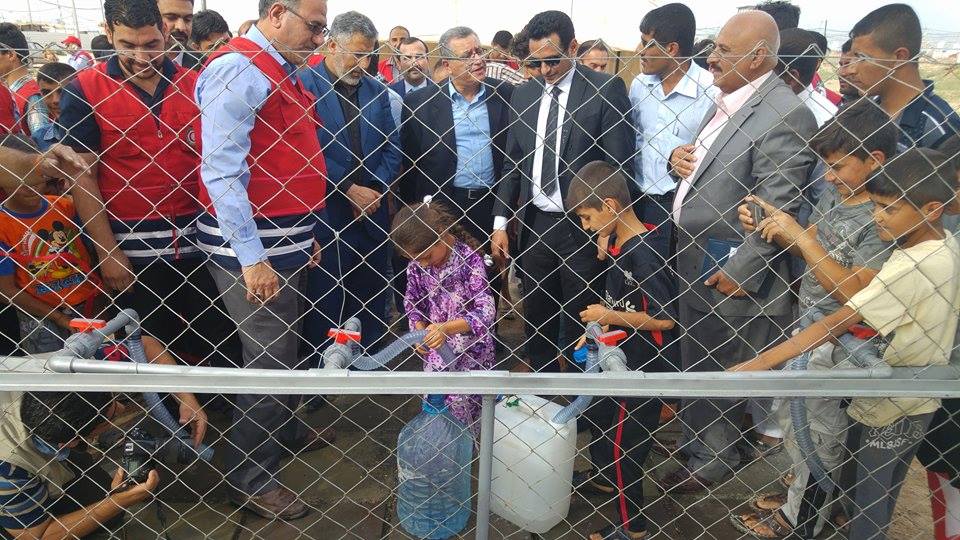 جمعية الهلال الاحمر العراقي تفتح   محطة تعبئة ماء (IRO) النازحين بكربلاء