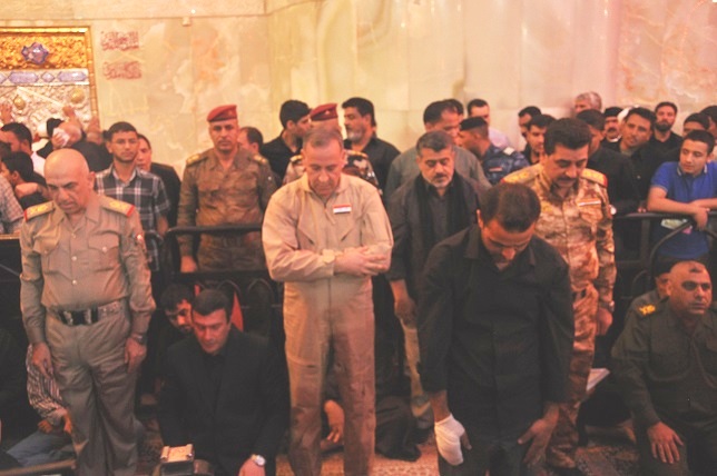 وزير الدفاع يزور مرقد الامام الحسين:لاصحة لدخول قوات برية امريكية للانبار والعراق لايحرره الا العراقيون(مصور)