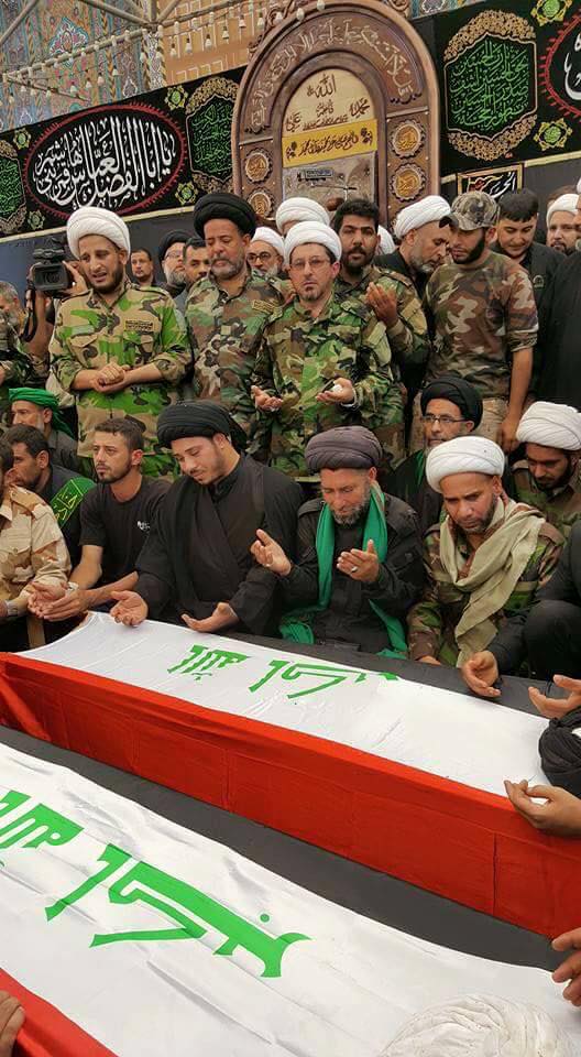 بالصور :الحوزة العلمية بالنجف تشييع شهدائها في الموصل