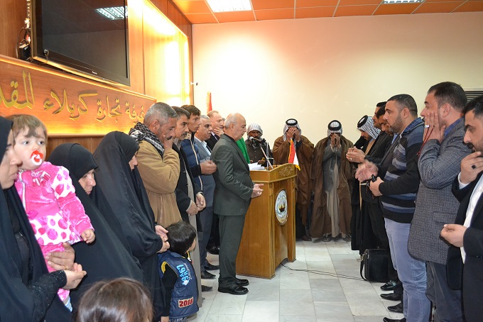 غرفة تجارة كربلاء  تكرم عوائل شهدا ء الحشد الشعبي