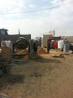 كربلاء:منظمة الهجرة الدولية iom تتبرع بصب الارضيات للنازحين