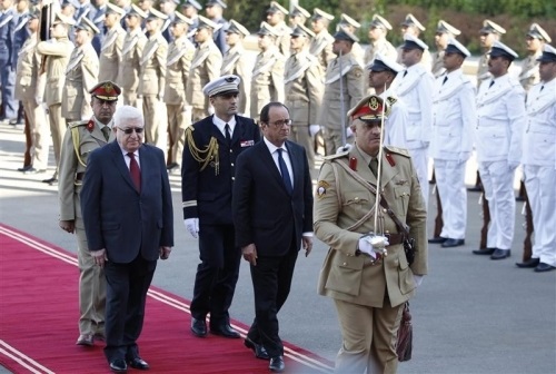 الرئيس الفرنسي يصل الى بغداد