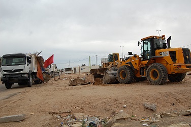 بالصور:حملة لإزالة التجاوزات في مدخل كربلاء – نجف