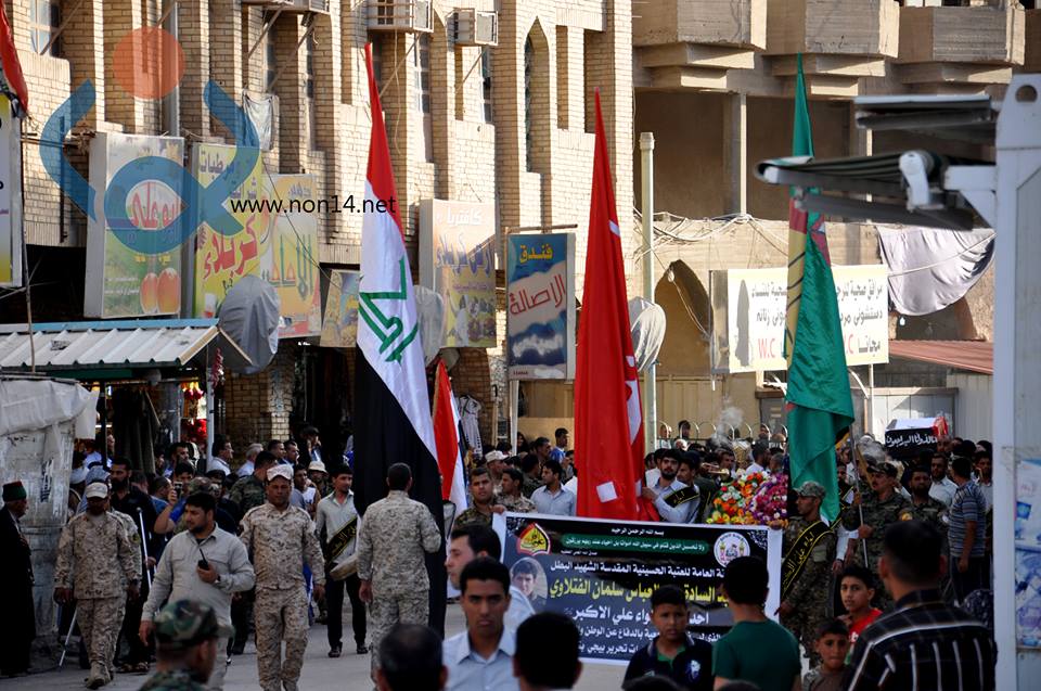 بالصور:جماهير كربلاء تشيع احد ابطال لواء علي الاكبر والذي استشهد خلال عمليات تحرير بيجي