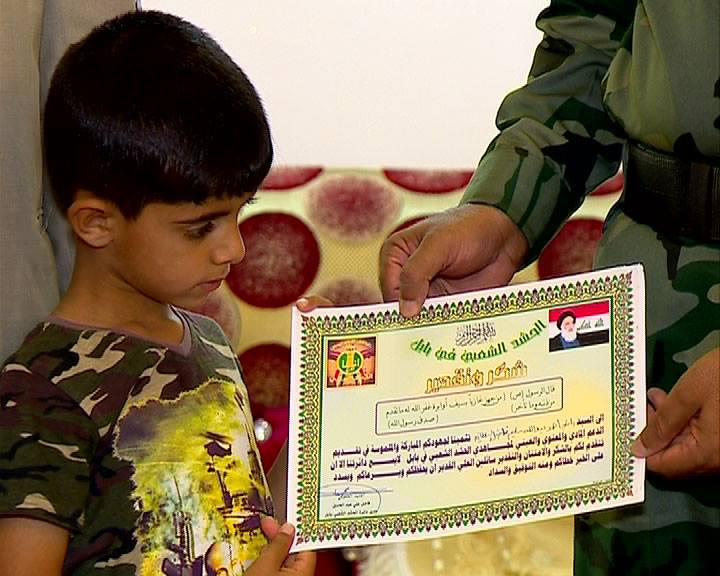 بابل :طفل في ربيعه الخامس يتبرع بأمواله الى أبطال الحشد الشعبي