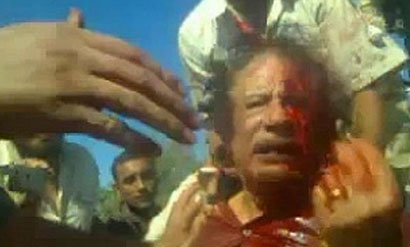 اللحظات الأخيرة في حياة القذافي ترويها الأمم المتحدة.!!!