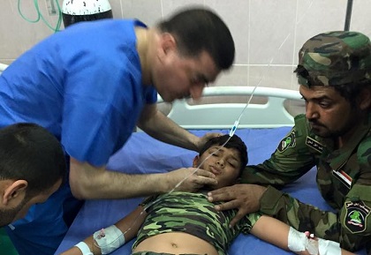 بالصور:مصطفى من مواليد 2005 يشارك بتحرير تكريت ويصاب برصاص قناص