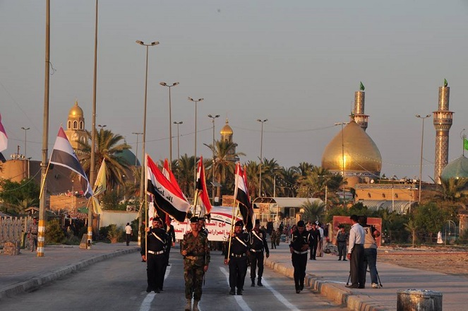 تقرير مصور : النجف تشهد اكبر استعراض عسكري لفوج الشهيد ميثم التمار الخاص بحماية المزارات الشيعية