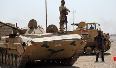 الجيش العراقي يقتحم تكريت ومعارك وسط المدينة مع داعش