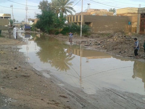 فيضانات بسبب الامطار في حي الضباط شارع الصناعة في قضاء طويريج بكربلاء(مصور)