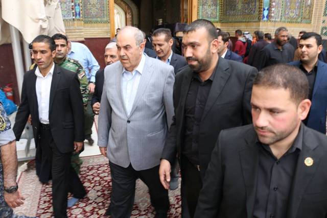 علاوي يتشرف بزيارة امير المؤمنين علي بن ابي طالب عليه السلام بالنجف الاشرف (مصور)