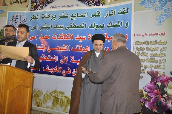 مديرية الوقف الشيعي في النجف الاشرف توزع وحدات سكنية على موظفيها