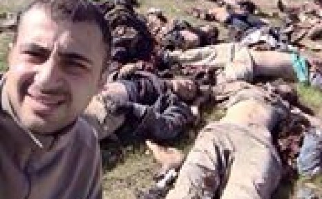 بالصورة.. جندي عراقي يلتقط "سيلفي" مع داعش ..!!