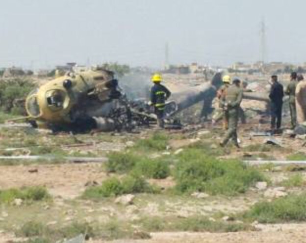 بالصور:سقوط طائرة هلوكوبتر وسط الكوت