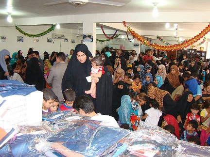 توزيع كسوة العيد على 600 طفل في كربلاء