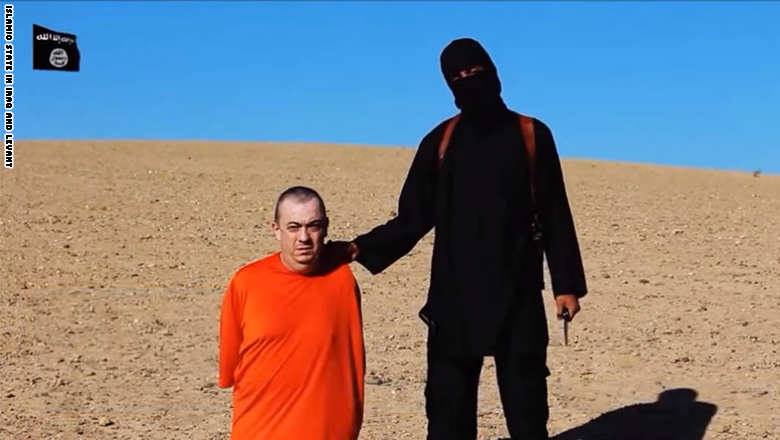 فيديو لداعش يظهر قطع رأس الرهينة البريطاني هينينغ وتهديد بقطع رأس آخر