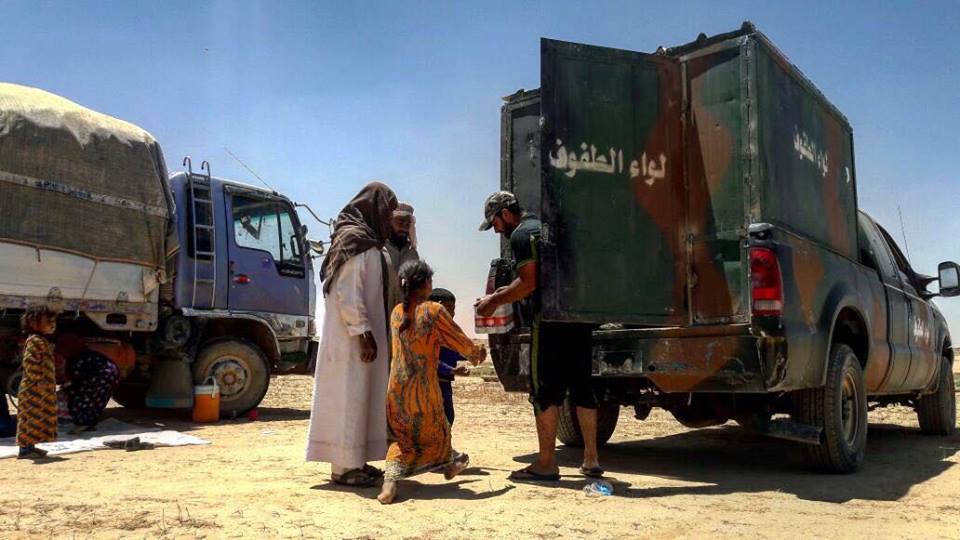 لواء الطفوف بعد تحرير البعاج يستقبل حشود النازحين من المنطقة المحررة مقدما كافة المساعدات الطبية والغذائية