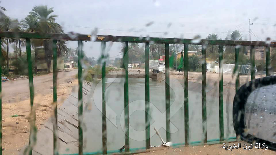 بالصورة: امطار غزيرة تشهدها كربلاء وارتفاع منسوب نهر الحسينية المغذي لبساتين المحافظة