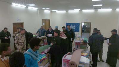 منظمة دولية تصل كربلاء توزع مساعدات انسانية على العوائل النازحة من الفلوجة +صوره