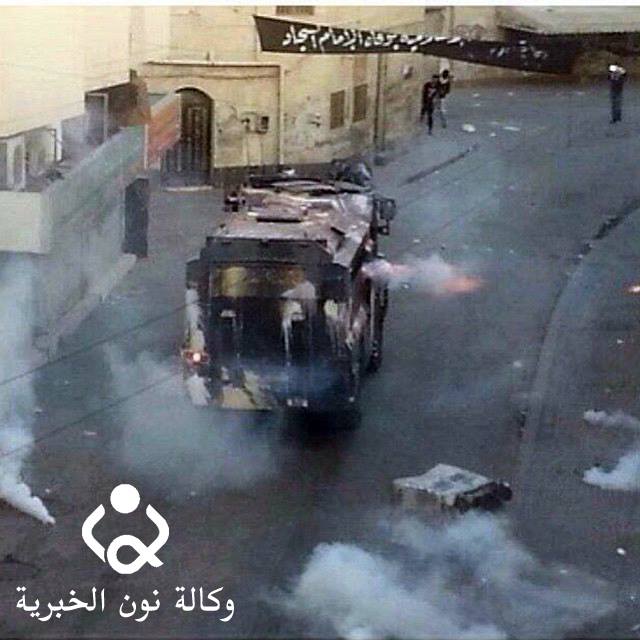 عاجل بالفيديو :مدرعات الحكومة توجه رصاصاتها على المتظاهرين بالبحرين+صورة