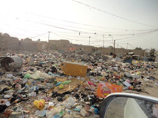 نفايات تهدد عوائل فقيرة بالامراض في كربلاء وسط مطالبات برفعها  (مصور)