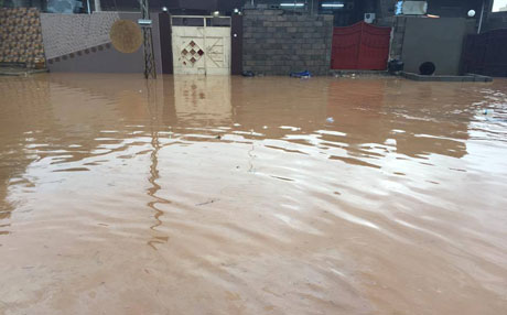 بالصور : مياه الامطار تغمر مدينة كركوك