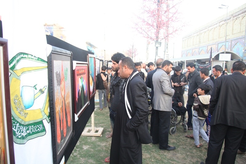 بالصور: اطول معرض فني يتجول في ثلاث محافظات  ولأكثر من 12 يوم يعرض جرائم داعش ويوثق لزوار الاربعين