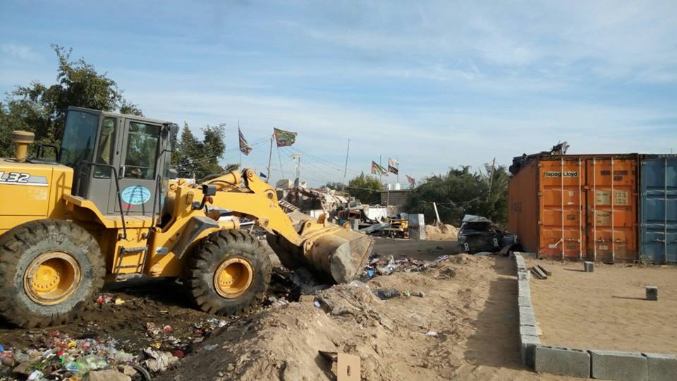 بالصور:بلدية كربلاء حملات لإزالة تجاوزات الحي الصناعي وأخرى للتنظيف