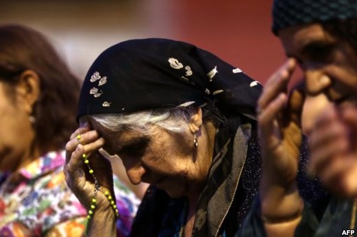 مسيحيو العراق يدفنون موتاهم تحت تهديد بنادق داعش