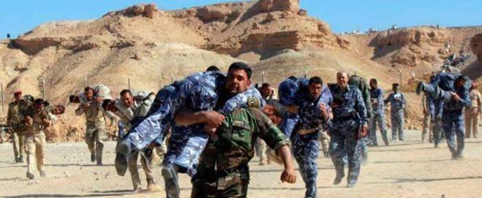 بالصور :تدريبات فصائل الحشد الشعبي في النجف الاشرف