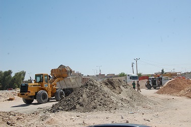 بالصور:حملة لإزالة سكلات المواد الإنشائية في كربلاء