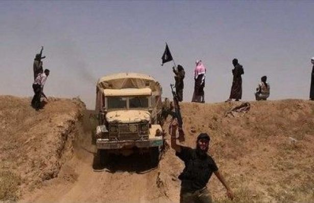 "داعش" يغلق الحدود العراقية السورية لمنع هروب عناصره الى الرقة