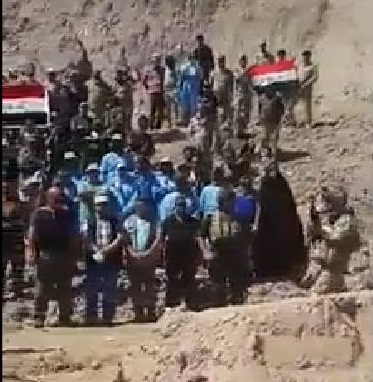 بالفيديو :مراسيم الاعلان عن البدء بفتح المقابر الجماعية لضحايا مجزرة سبايكر