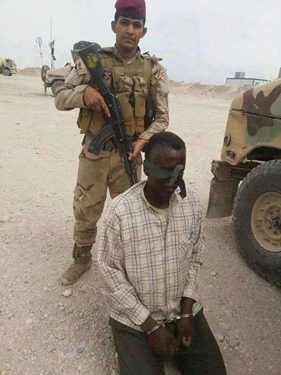 بالصورة القبض على ارهابي مسلح في الفلوجة