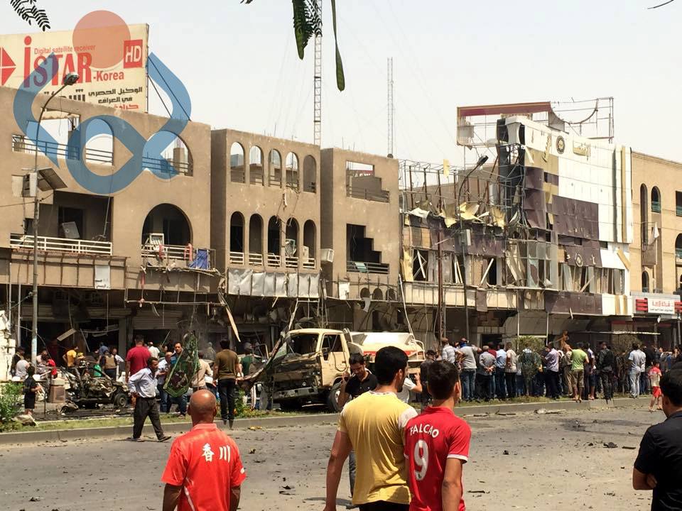 بالصور:شهيد و13 جريحا على الاقل في حصيلة تفجير الكرادة