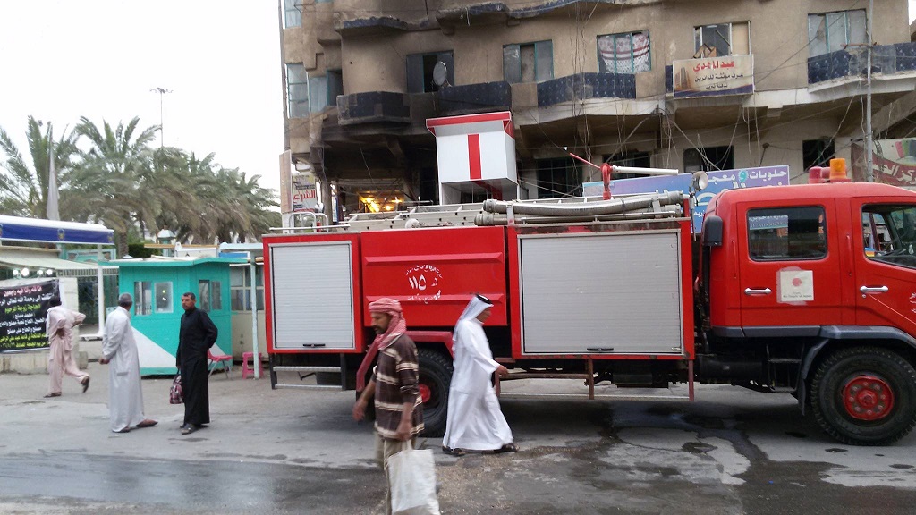 بالصور:حريق في بناية وسط مركز المدينة القديمة بكربلاء