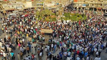 بالصور: اهالي الناصرية يتظاهرون دعماً لقرارات العبادي الإصلاحية