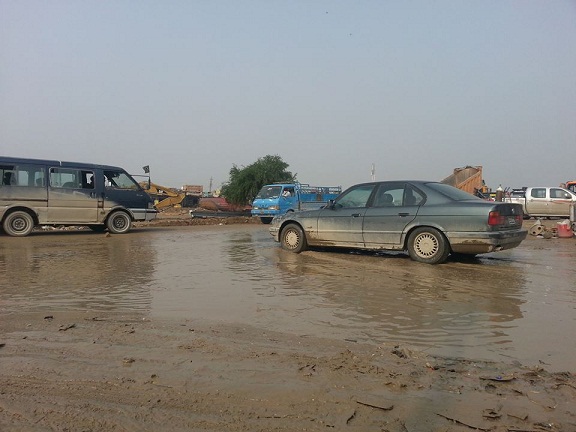 بالصور منطقة الحي الصناعي في كربلاء بعد يوم ممطر