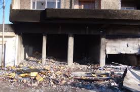 داعش الارهابي يفجر احد المصارف الاهلية ويحتوي على رصيد 6 مليارات دينار في تكريت