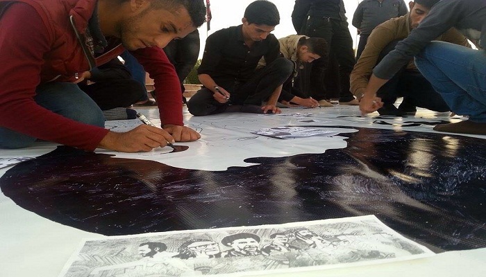 بالصور:هواة الفن في كربلاء يرسمون أكبر لوحة لرموز العراق