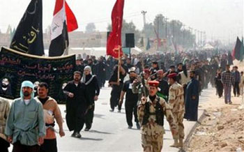 رغم العواصف الرملية ...مرضى الربو يواصلون مسيرهم الى كربلاء