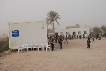 مدرسة في  كربلاء على الهواء الطلق (مصور)