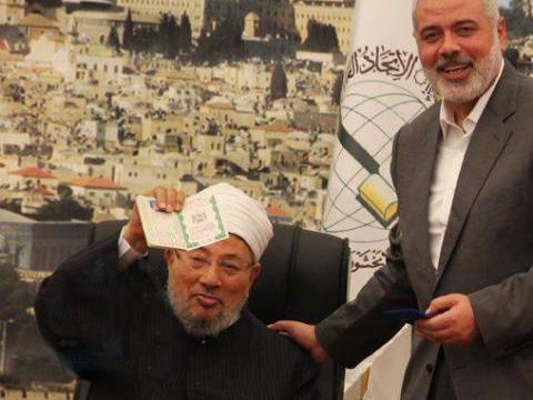 وزارة الداخلية الفلسطينية :القرضاوي يحمل جوازاً فلسطينياً مزوراً!!؟