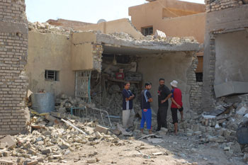 موقع نون ينفرد بنشر صور الانفجار الارهابي الذي شهدته كربلاء