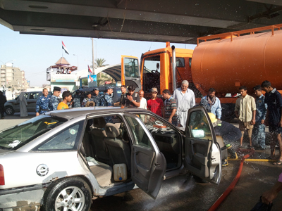 احتراق سيارة وسط كربلاء (مصور)