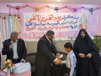 تكريم الأيتام والأرامل العلويين في كربلاء