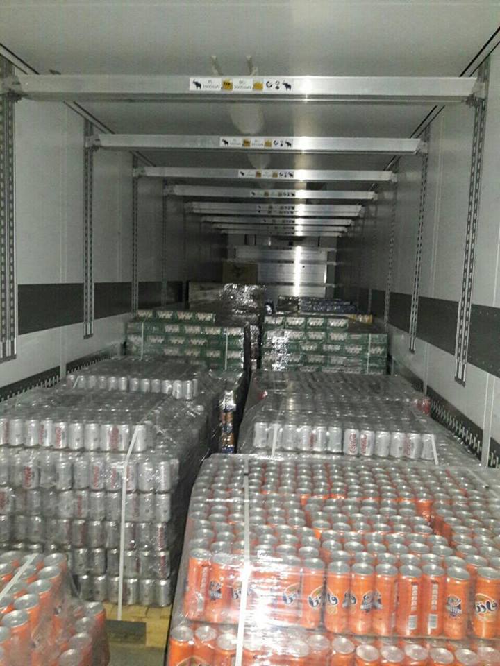 بالصور:القبض على خمس شاحنات محملة بمواد مختلفة غير خاضعة للرسوم الكمركية متجهة صوب السفارة الامريكية ببغداد